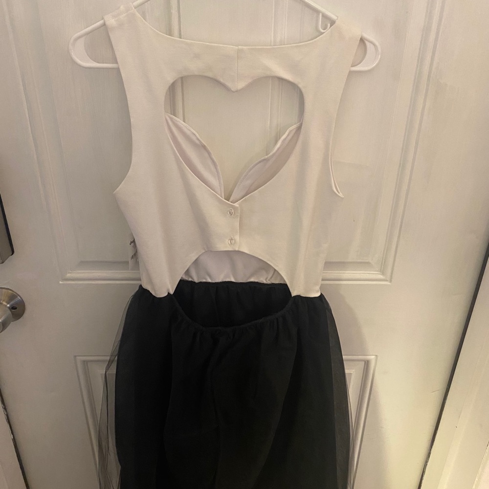 Black and white ruffle dress with heart back